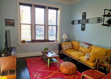 Logan Sq Condo with Direct Entry from the Street and Large Living Area and Kitchen